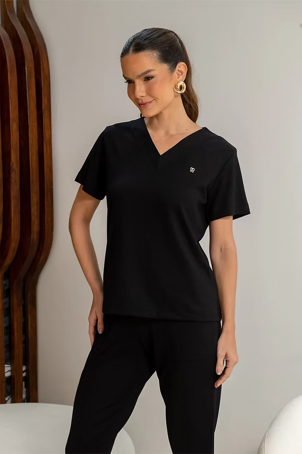 Chanel — Uniforme con pantalón encauchado