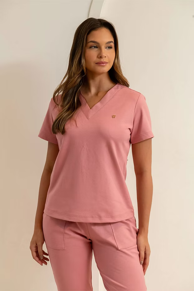 Chanel — Uniforme con pantalón encauchado