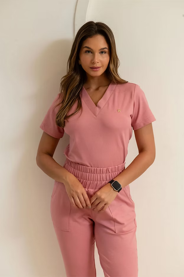 Chanel — Uniforme con pantalón encauchado